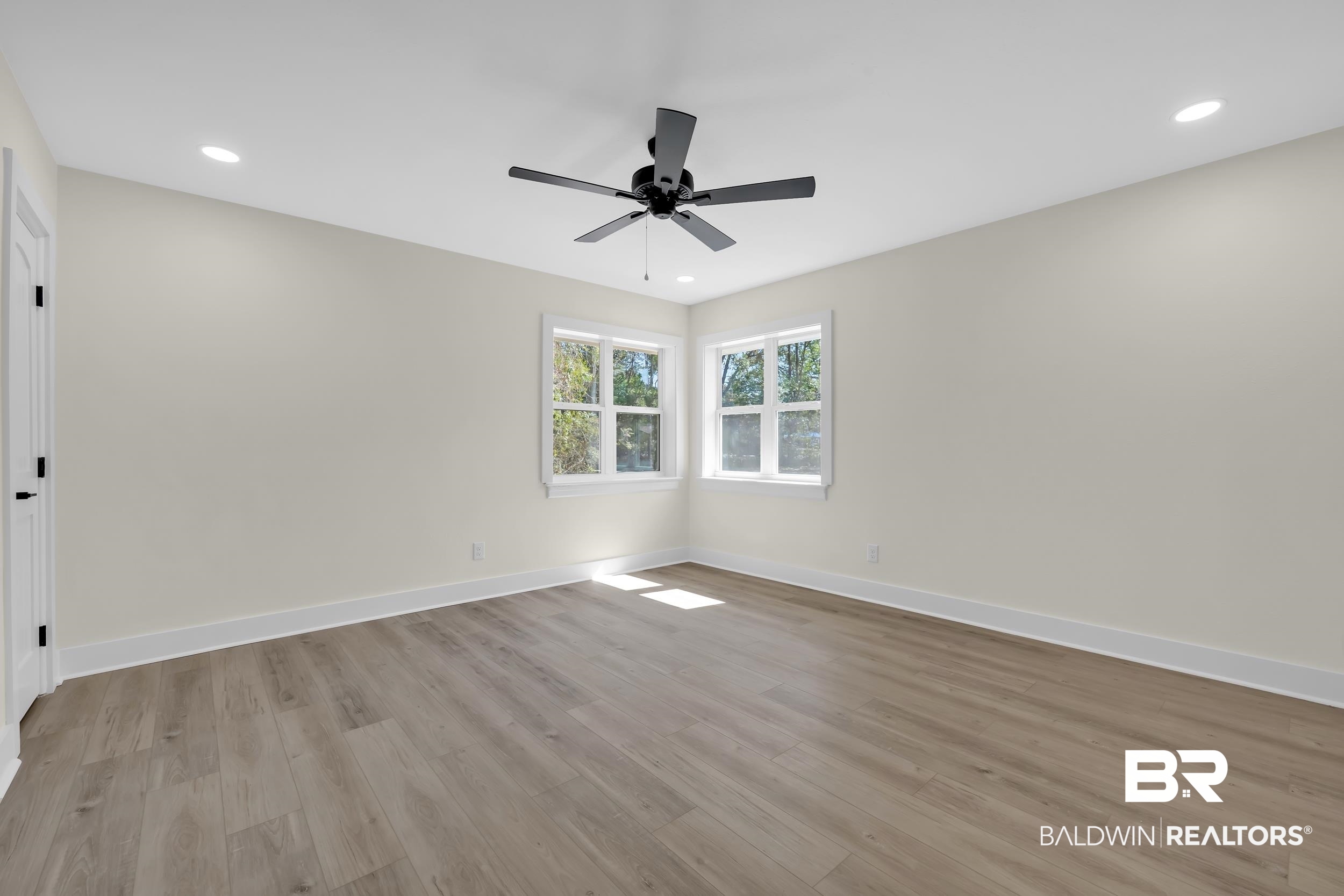 1409 Altair Lane Mobile, AL 36693 - Photo 10 of 23 Empty room with recessed lighting, light wood-type flooring, and a ceiling fan
