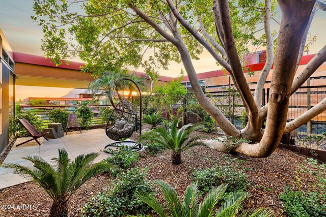 a view of a backyard of a house