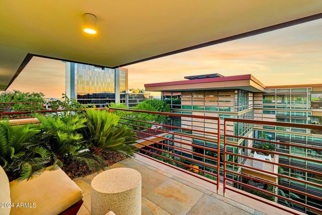 a bathroom with a shower and a sink
