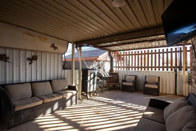 a view of a livingroom with furniture and a couch