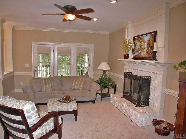 6400 Northwyck Place Raleigh, NC 27609 - Photo 9 of 12 Open Family Rooom w/ Masonry Fireplace & Access to Screen Porch.