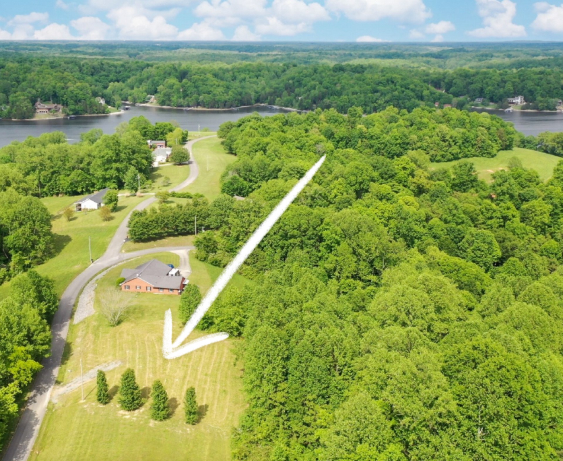 0 Andy Anderson Road Lynchburg, TN 37352 - Photo 3 of 11 a view of a lake with a yard