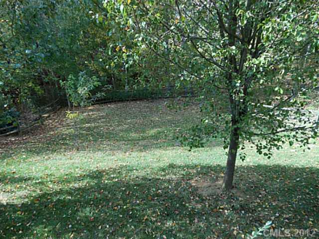 16023 Hollingbourne Road Huntersville, NC 28078 - Photo 9 of 12 a view of outdoor space and trees