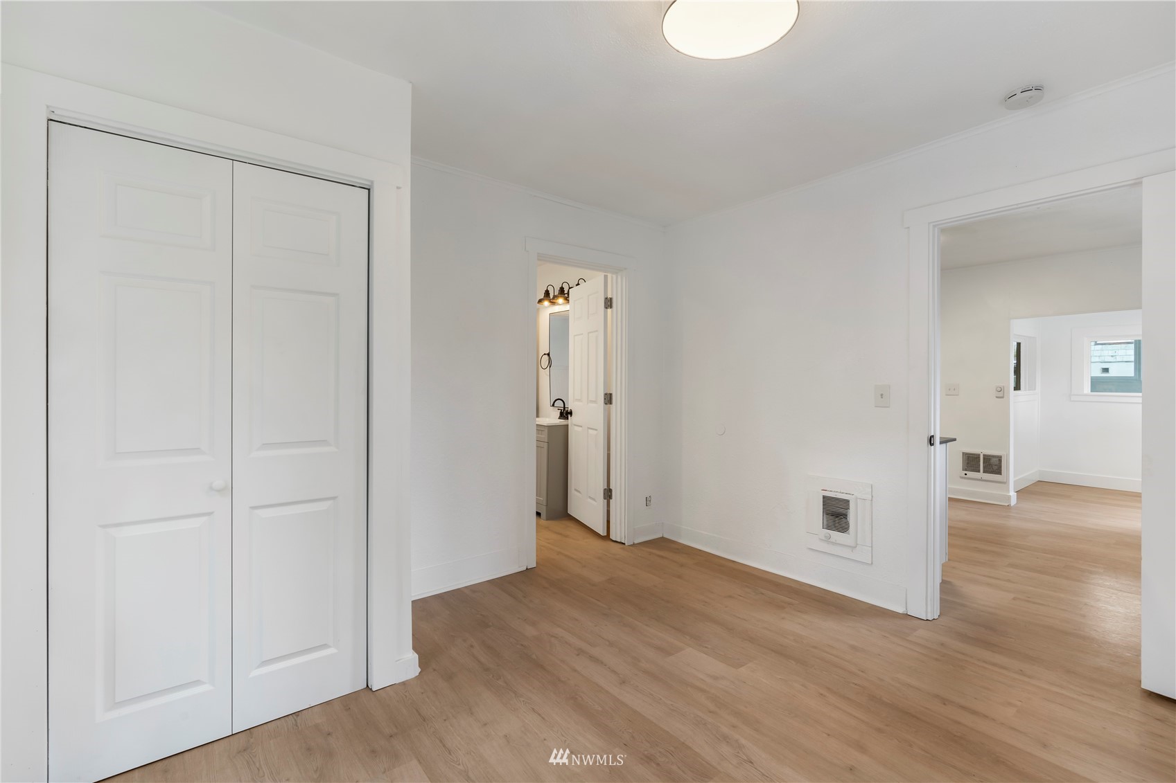 413 West 4th Avenue Pe Ell, WA 98572 - Photo 14 of 32 an empty room with wooden floor and closet