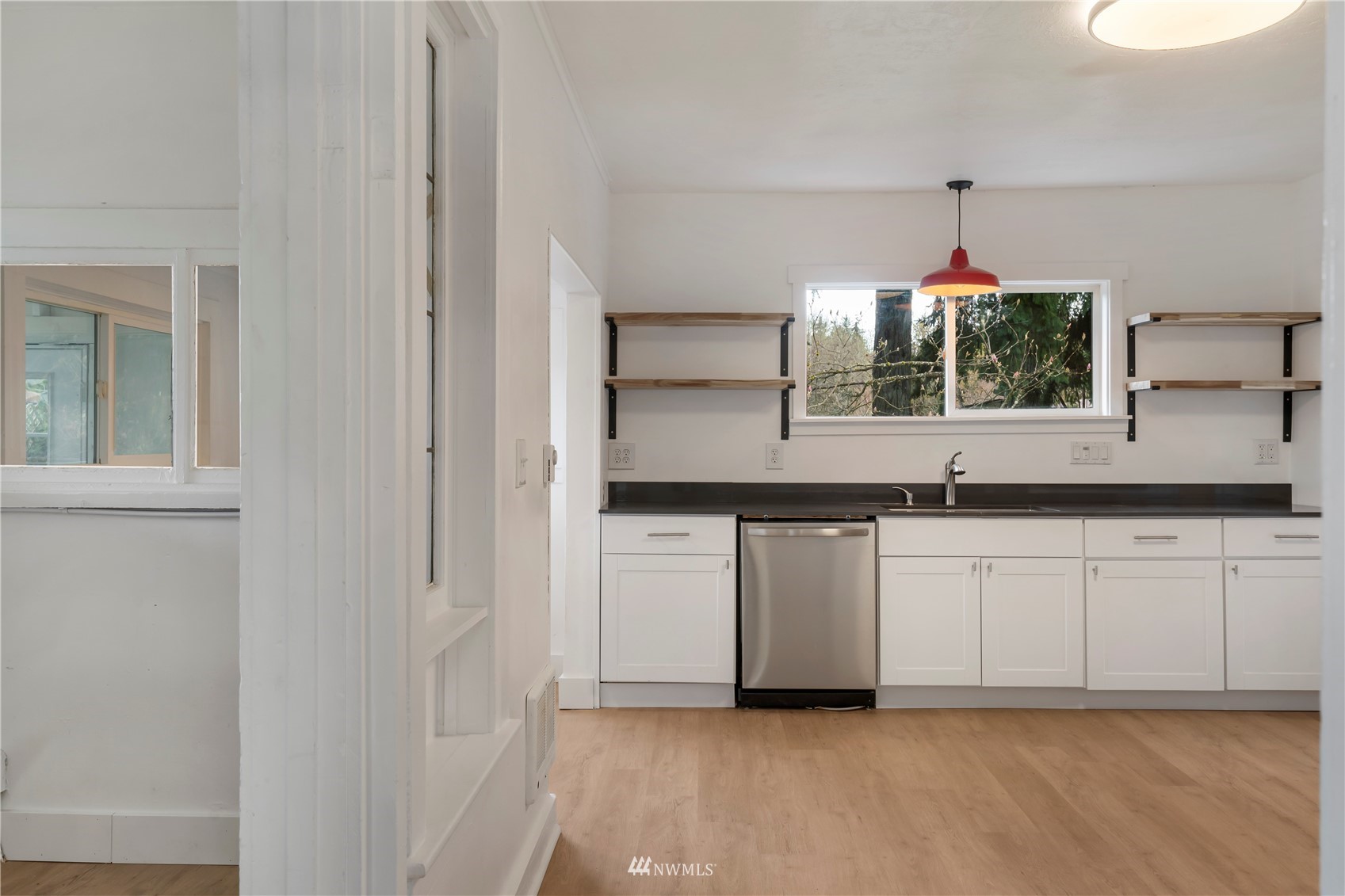 413 West 4th Avenue Pe Ell, WA 98572 - Photo 22 of 32 a kitchen with stainless steel appliances granite countertop a sink and a granite counter tops