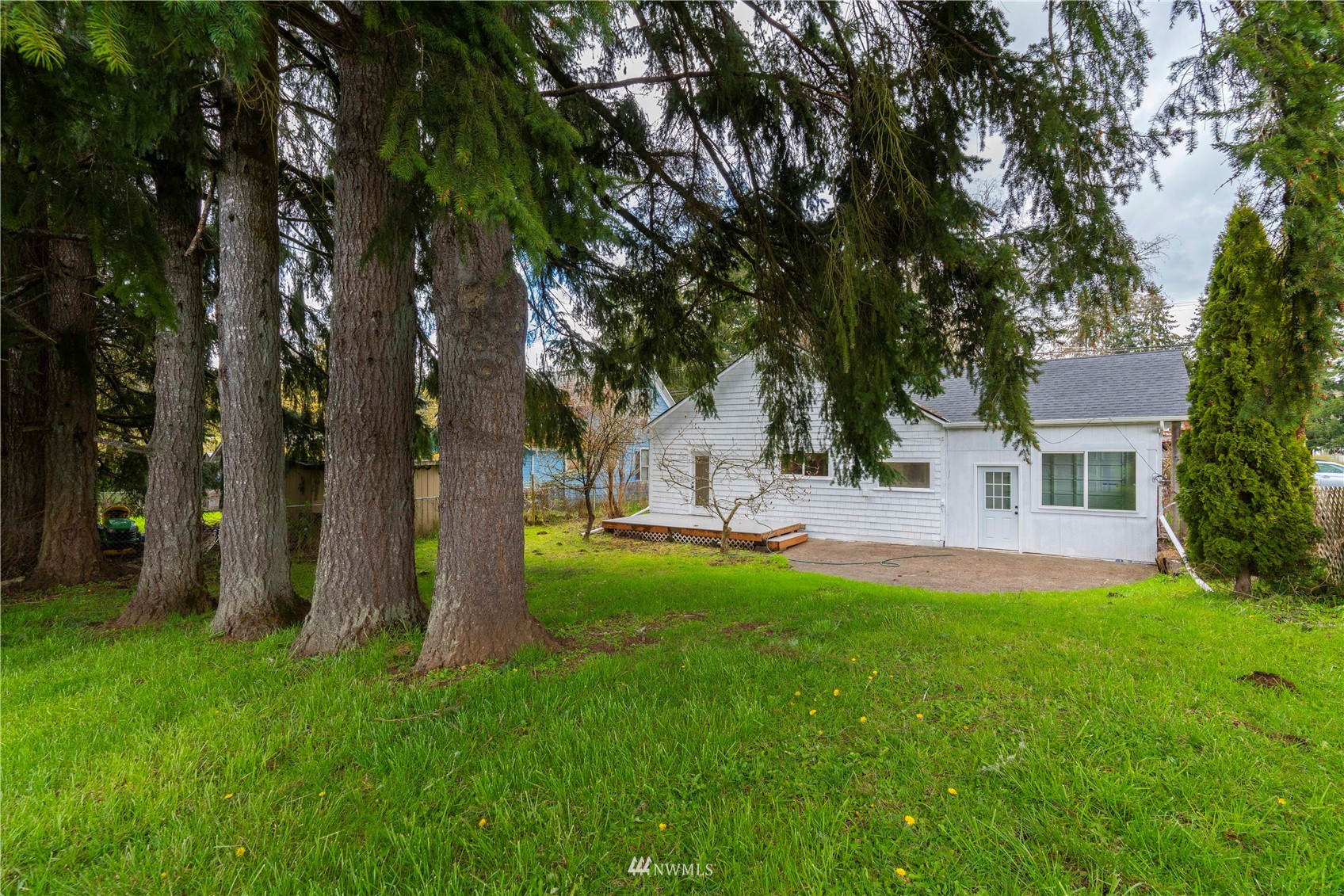 413 West 4th Avenue Pe Ell, WA 98572 - Photo 27 of 32 a view of a house with a yard
