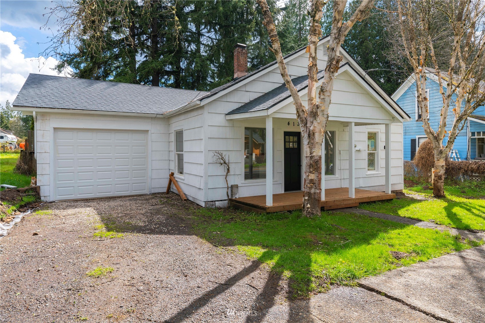 413 West 4th Avenue Pe Ell, WA 98572 - Photo 30 of 32 a view of a house with a yard and large tree