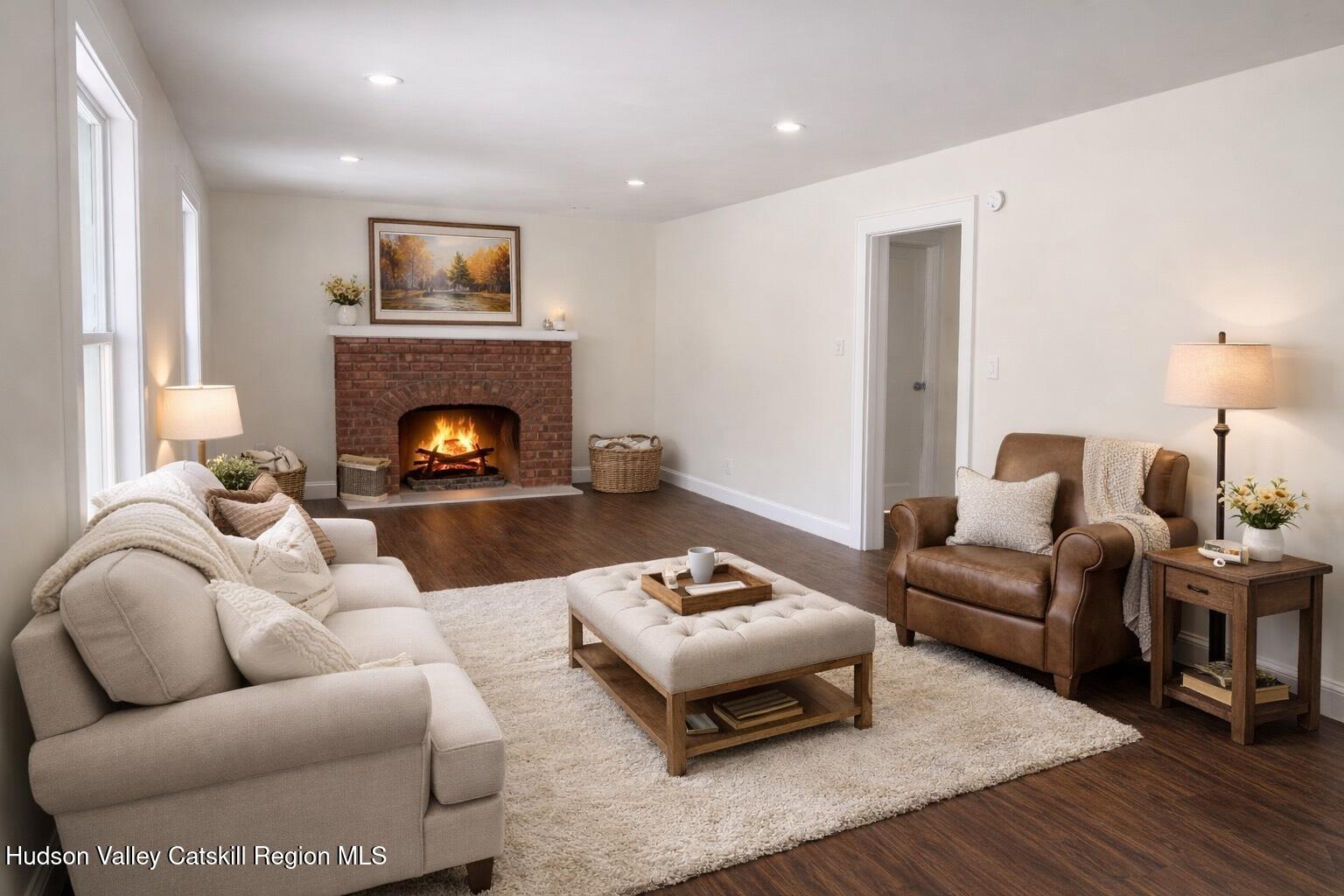 222 Zandhoek Road Hurley, NY 12443 - Photo 3 of 23 a living room with furniture and a fireplace