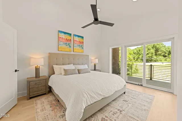 a view of a balcony with wooden floor and fence
