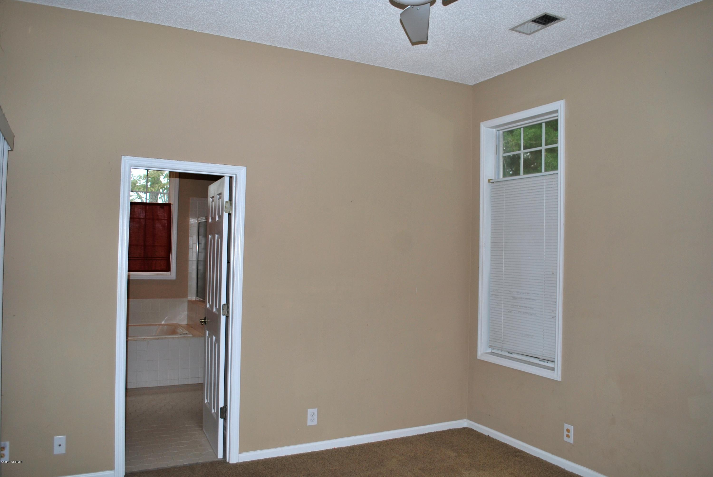 486 Genoe's Point Road Southwest Supply, NC 28462 - Photo 15 of 29 master bedroom