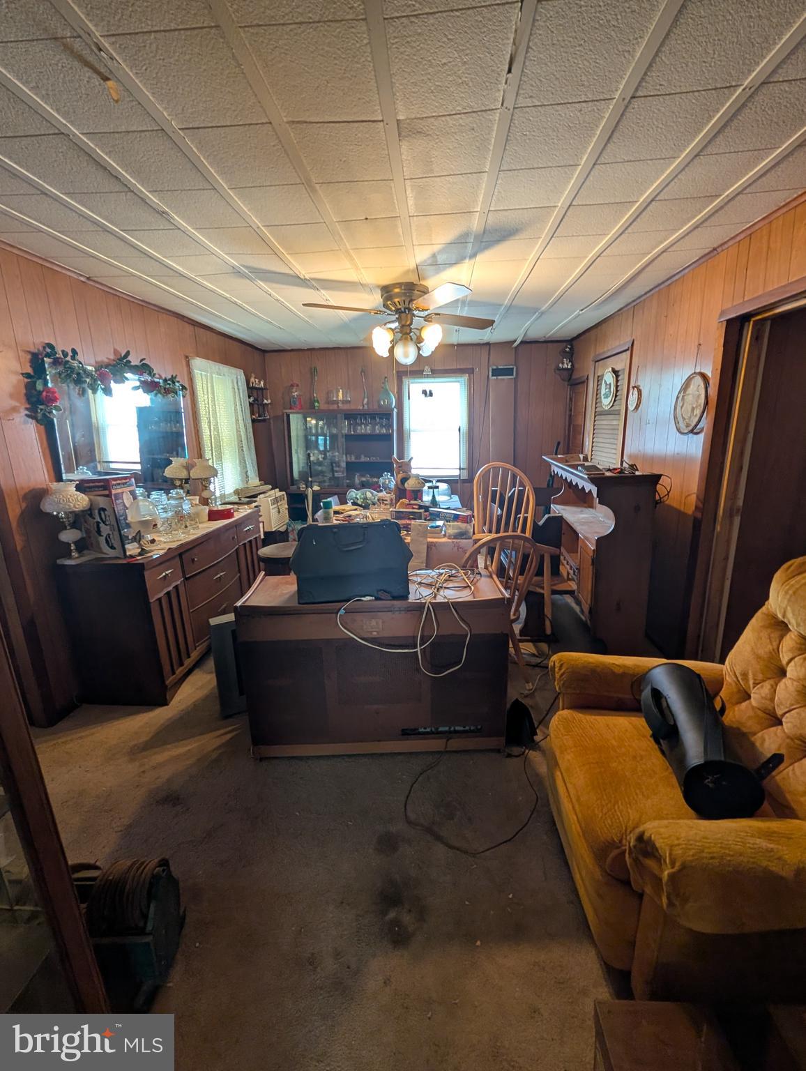 1990 Valley Road Parkesburg, PA 19365 - Photo 6 of 17 a living room with furniture and a chandelier