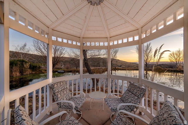779 South Silver Road Leeds, UT 84746 - Photo 61 of 80 Sunroom / solarium with a water and mountain view