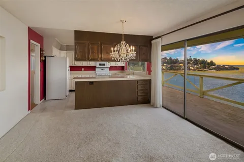 $2,100,000 | 3606 West Commodore Way, Seattle, WA 98199