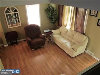 8615 Old Line Road Philadelphia, PA 19128 - Photo 2 of 12 a living room with furniture and a window