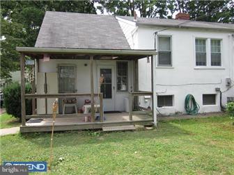 8615 Old Line Road Philadelphia, PA 19128 - Photo 7 of 12 a view of a house with backyard porch and sitting area