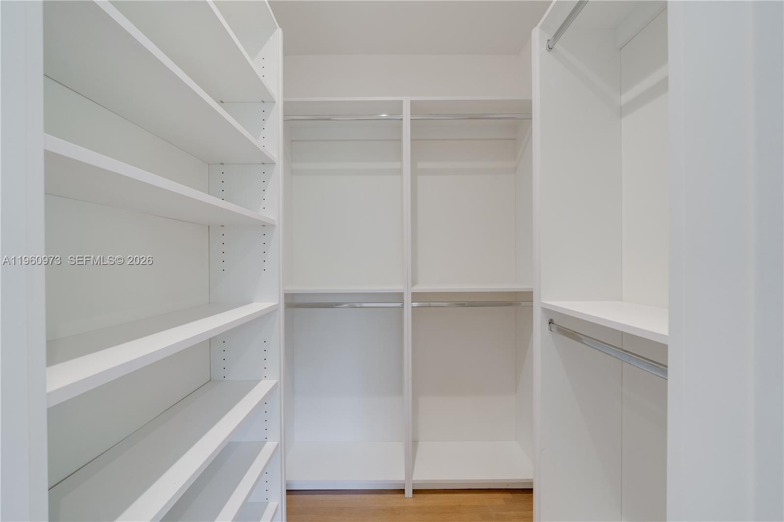 12535 Moss Ranch Road Pinecrest, FL 33156 - Photo 13 of 25 Primary Bedroom Walk-in Closet