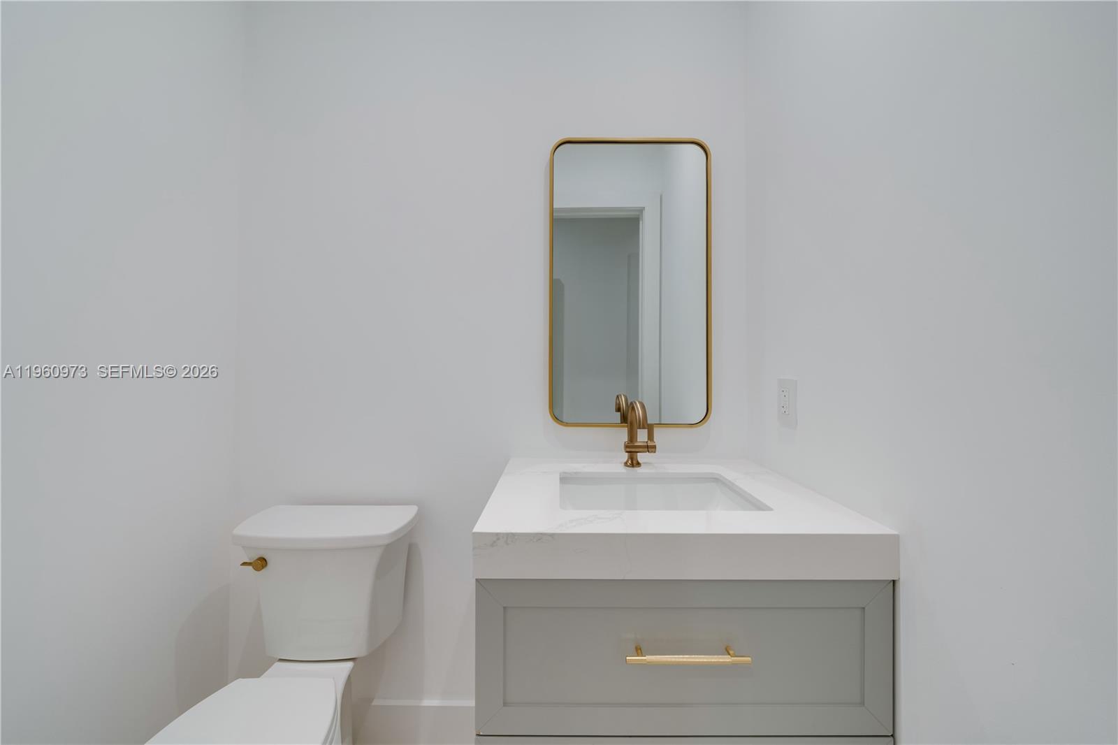 12535 Moss Ranch Road Pinecrest, FL 33156 - Photo 21 of 25 Powder Bathroom