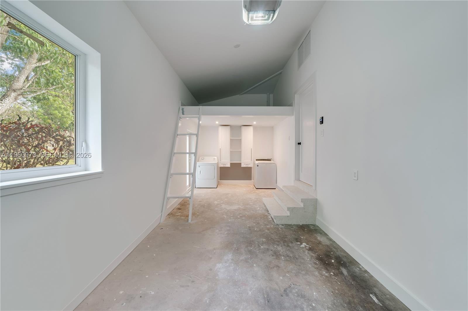 12535 Moss Ranch Road Pinecrest, FL 33156 - Photo 24 of 25 Laundry/ Loft Storage