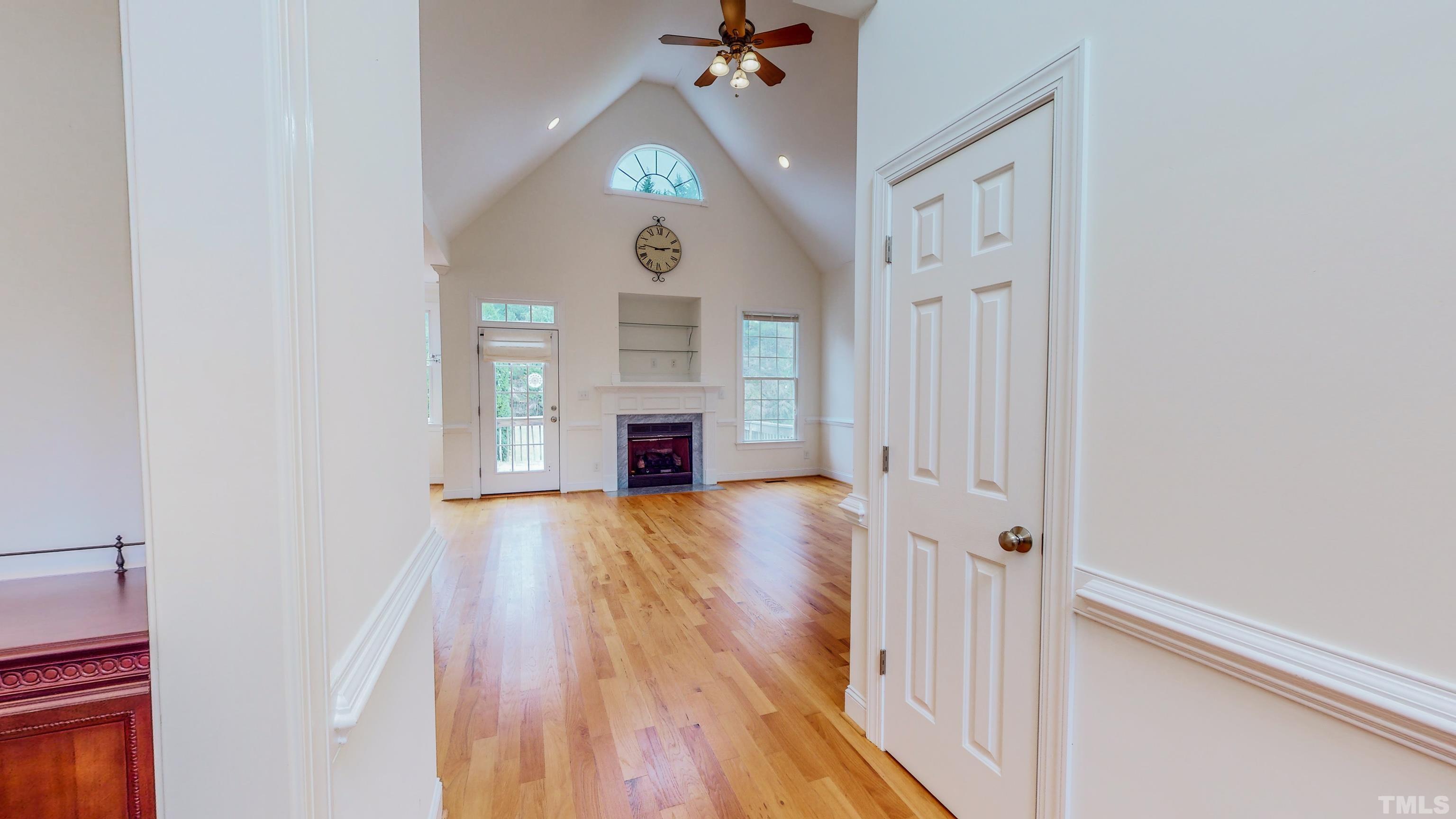 134 Fletcher Ridge Road Timberlake, NC 27583 - Photo 20 of 52 a view of empty room with wooden floor and fan