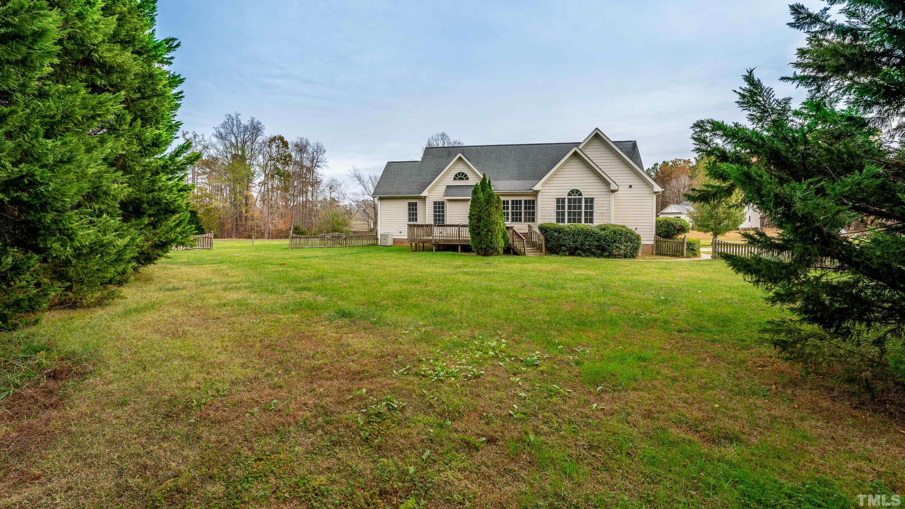 134 Fletcher Ridge Road Timberlake, NC 27583 - Photo 22 of 52 a front view of a house with yard and green space