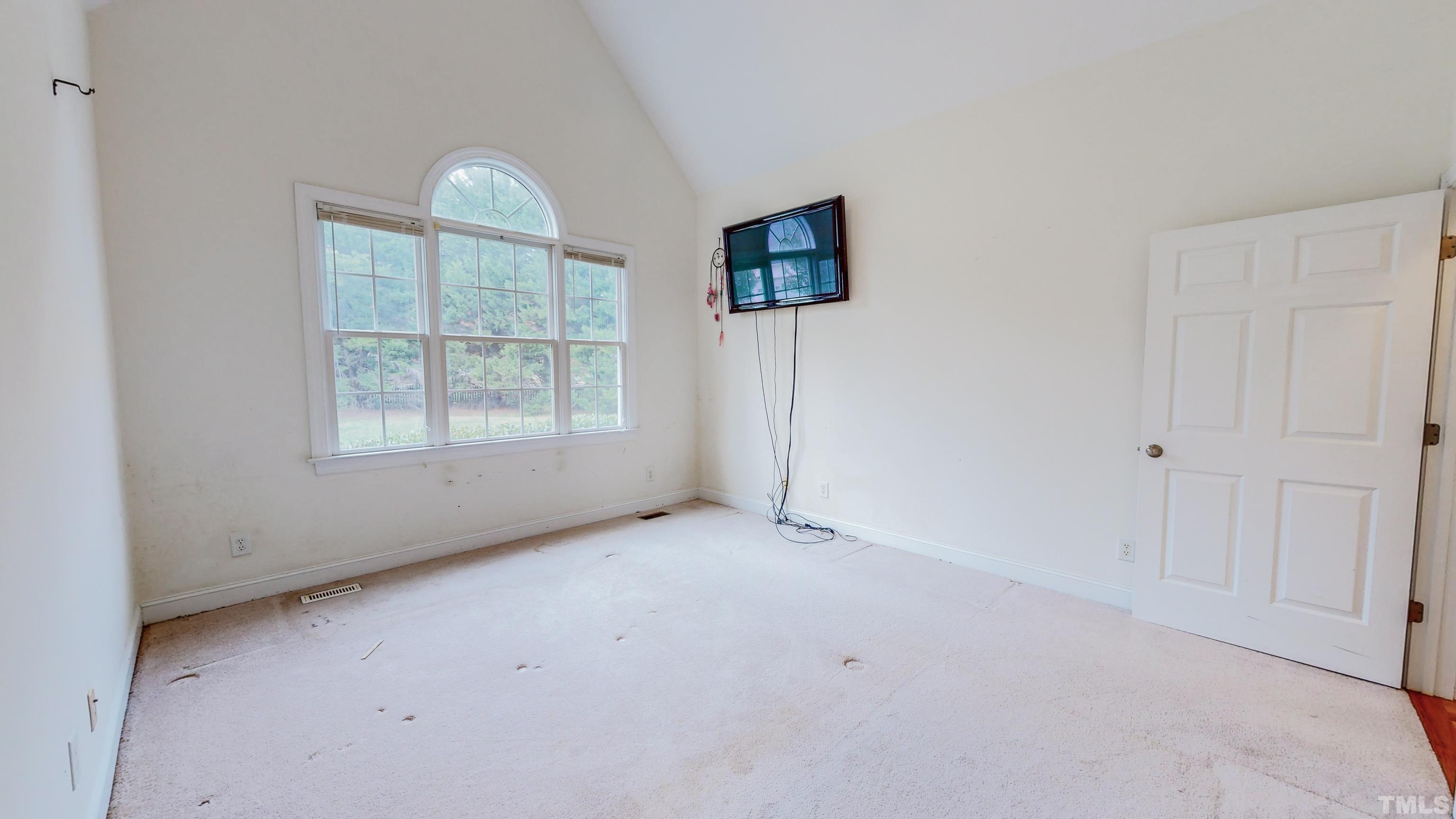 134 Fletcher Ridge Road Timberlake, NC 27583 - Photo 24 of 52 an empty room with windows