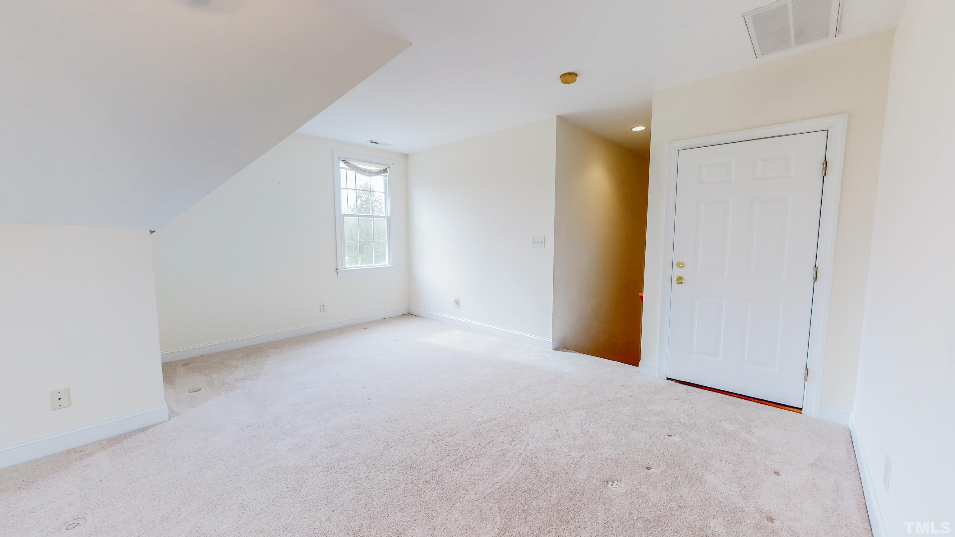 134 Fletcher Ridge Road Timberlake, NC 27583 - Photo 38 of 52 an empty room with windows and closet