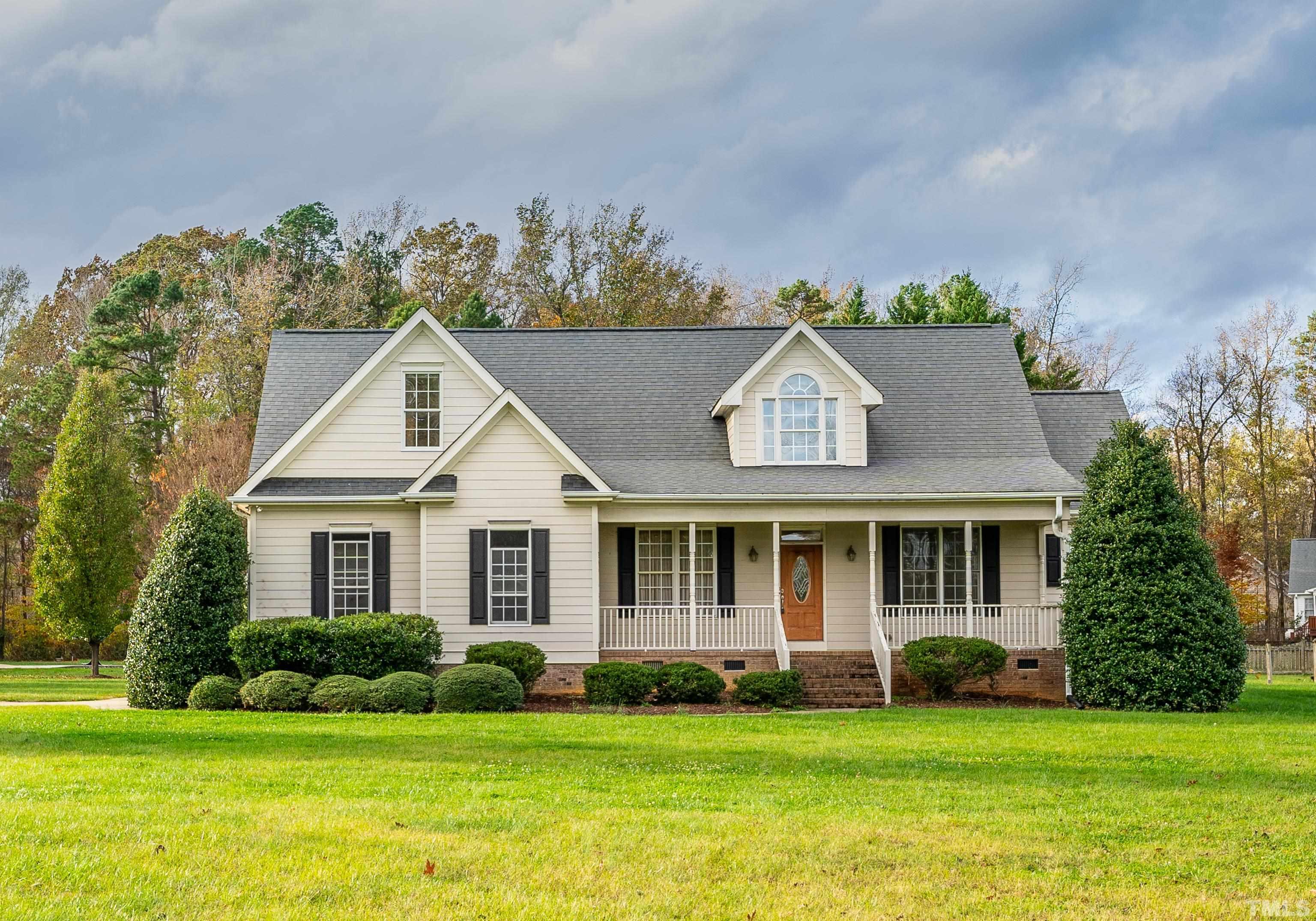 134 Fletcher Ridge Road Timberlake, NC 27583 - Photo 40 of 52 a front view of a house with a yard