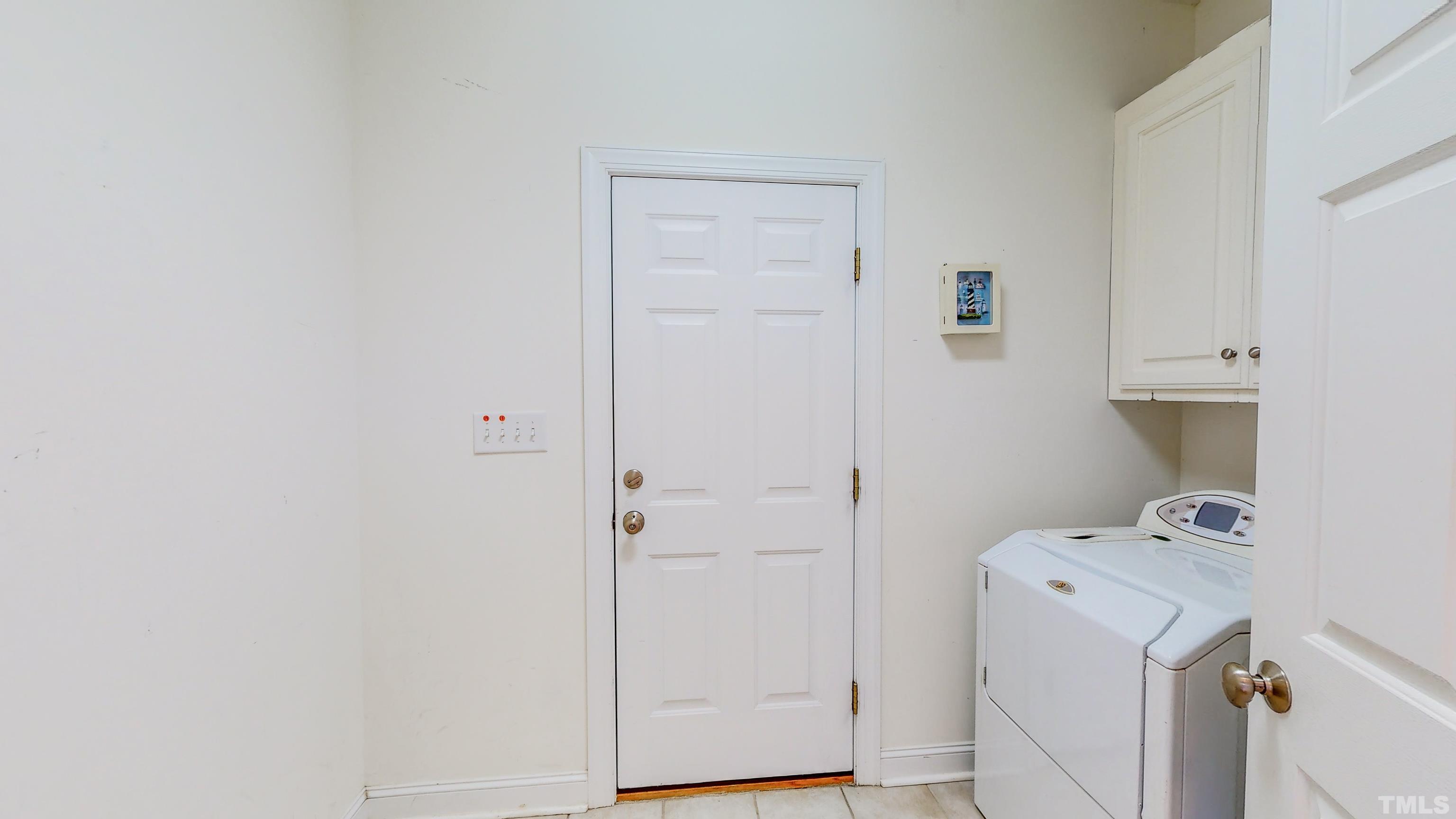 134 Fletcher Ridge Road Timberlake, NC 27583 - Photo 45 of 52 a view of utility room with washer and dryer