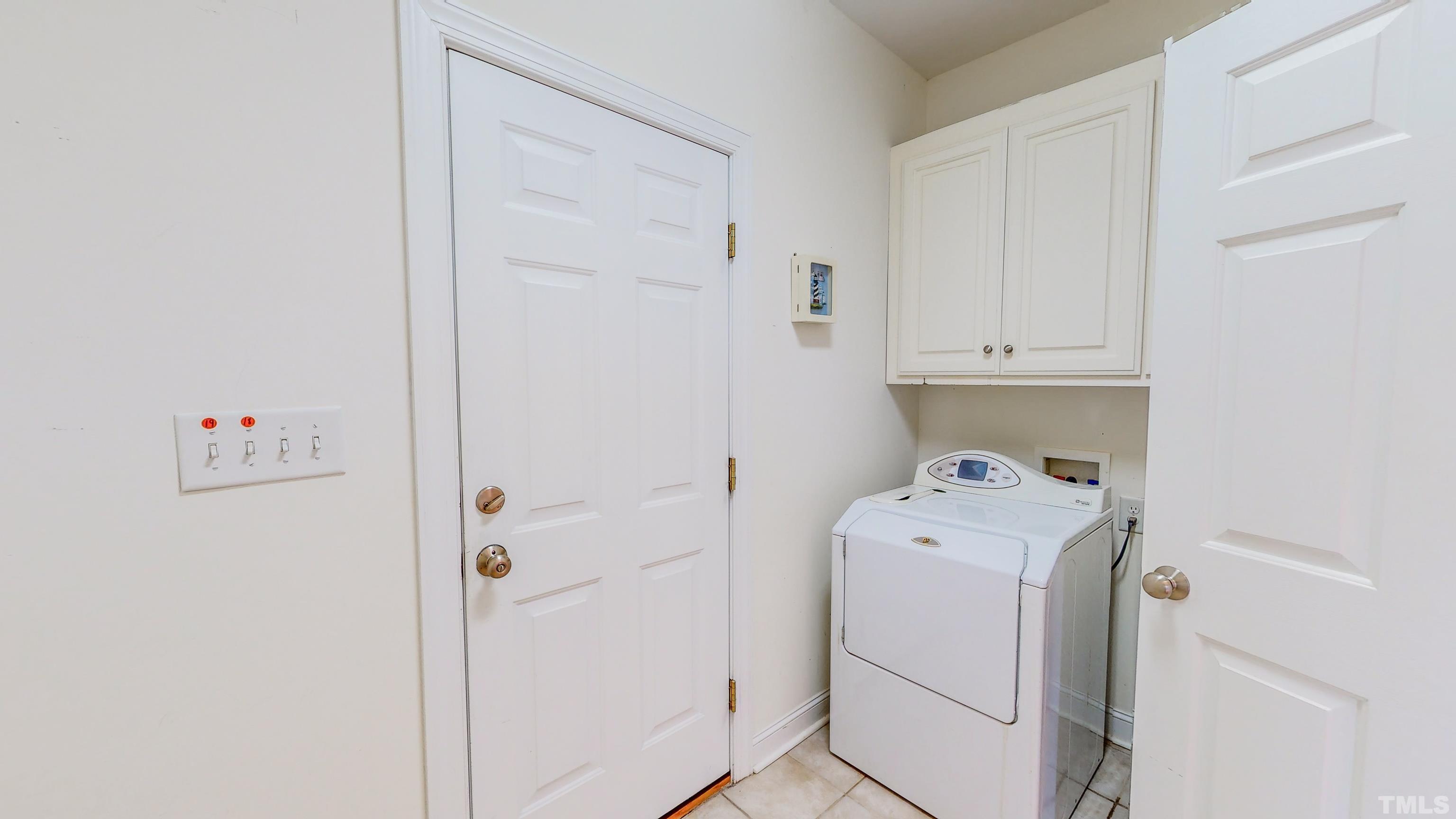 134 Fletcher Ridge Road Timberlake, NC 27583 - Photo 46 of 52 a utility room with dryer and washer