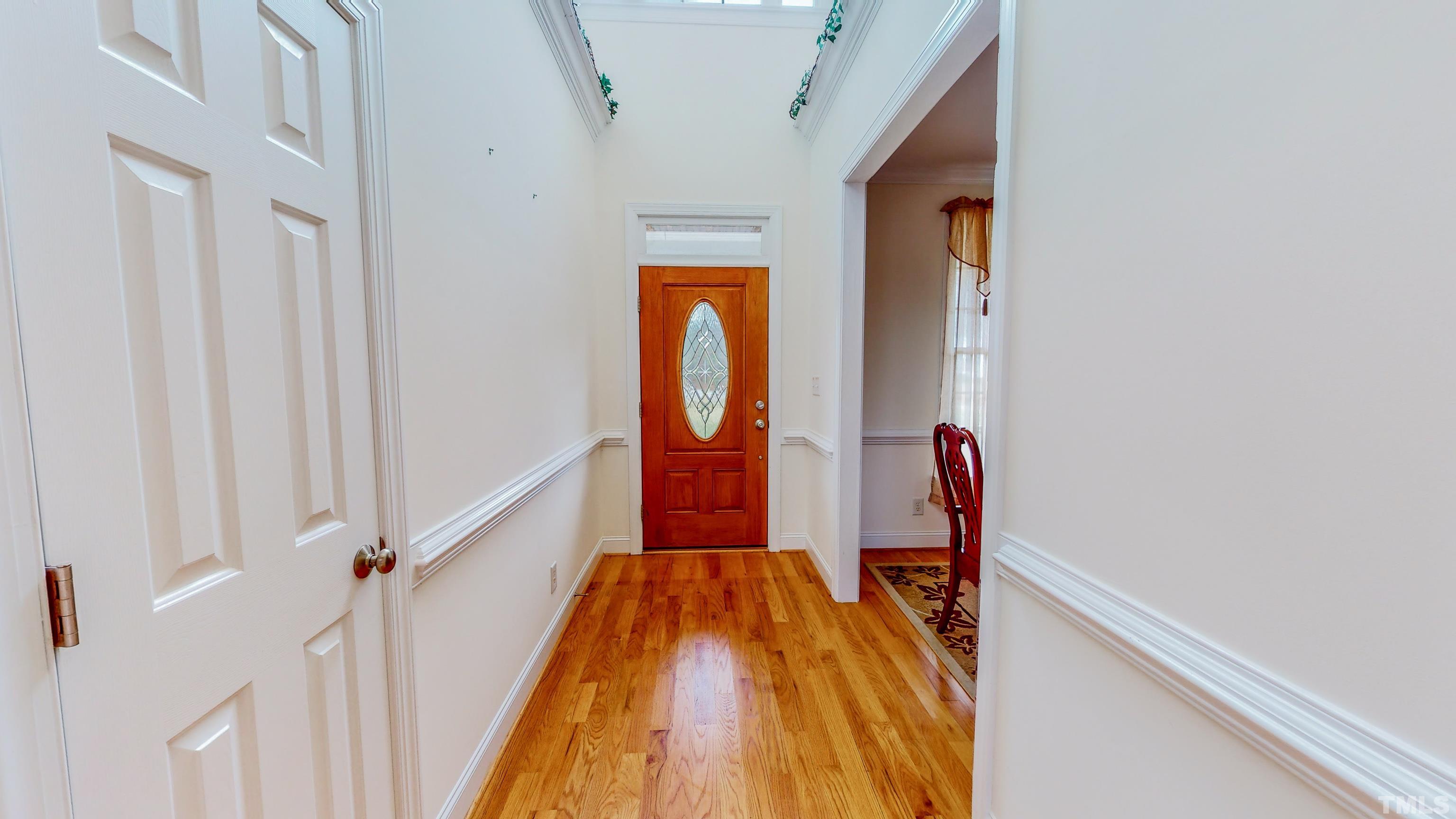 134 Fletcher Ridge Road Timberlake, NC 27583 - Photo 47 of 52 a very nice looking hallway with wooden floor