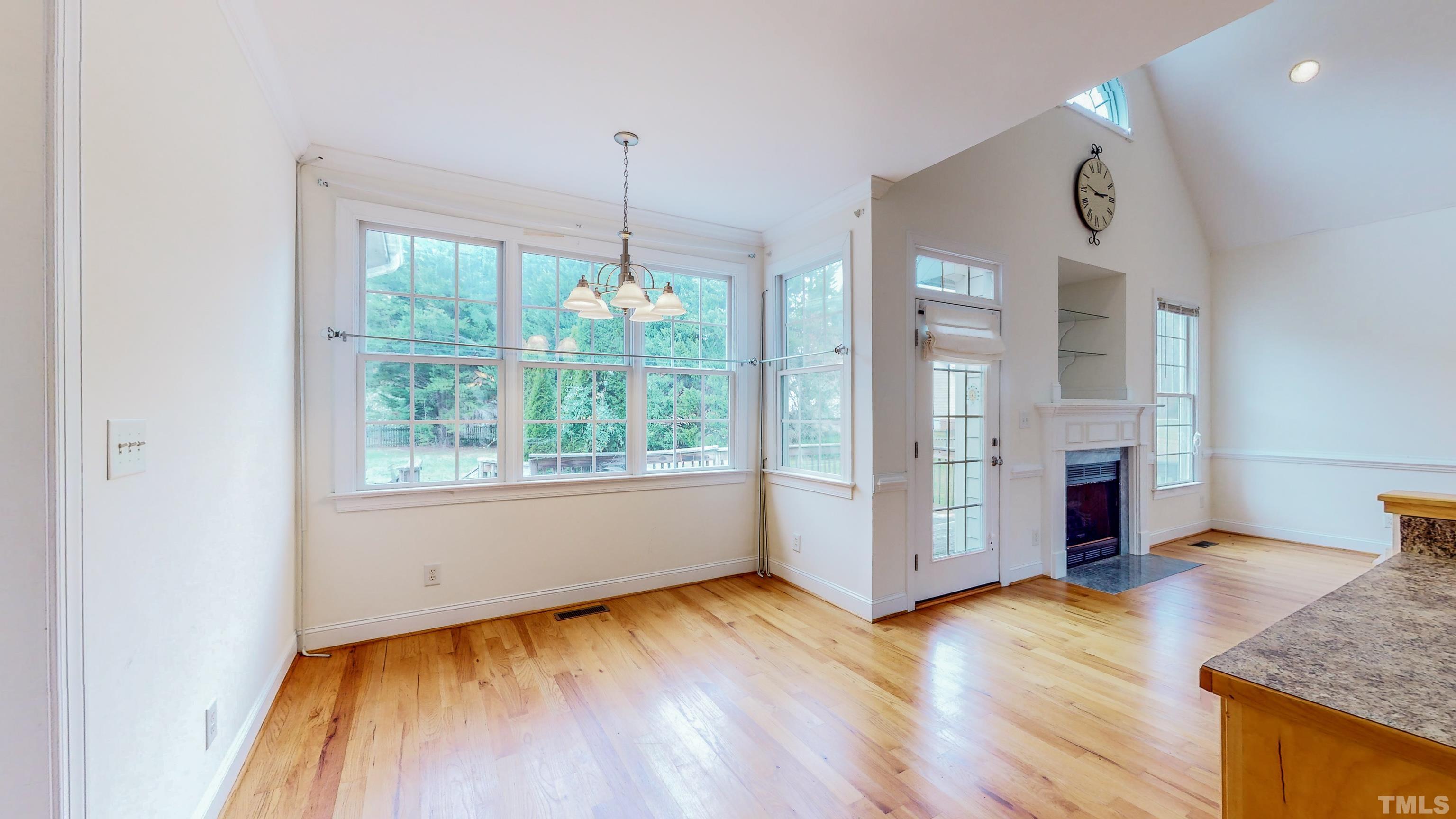 134 Fletcher Ridge Road Timberlake, NC 27583 - Photo 5 of 52 wooden floor in an empty room with a window