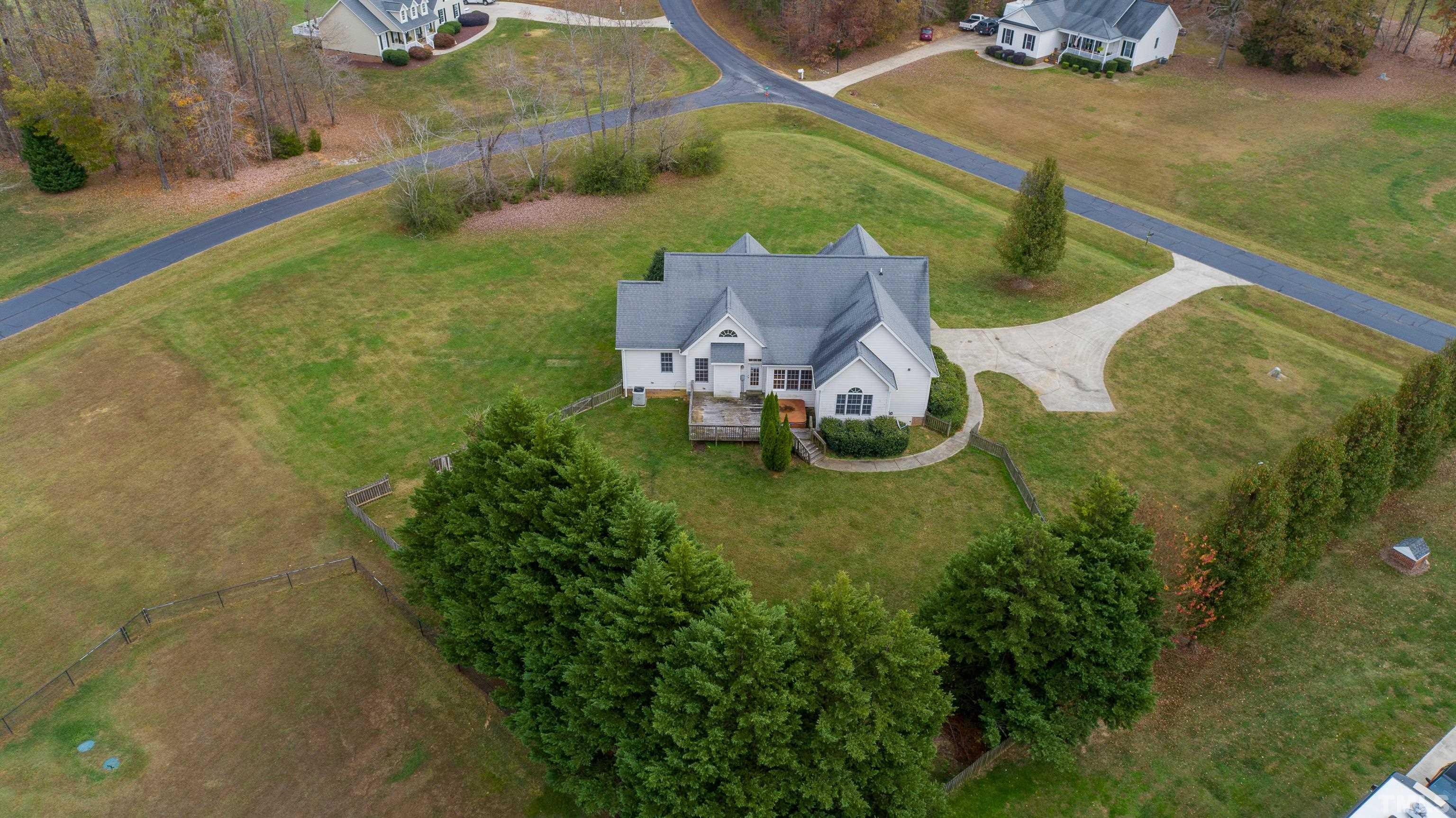 134 Fletcher Ridge Road Timberlake, NC 27583 - Photo 51 of 52 a view of a house with a yard