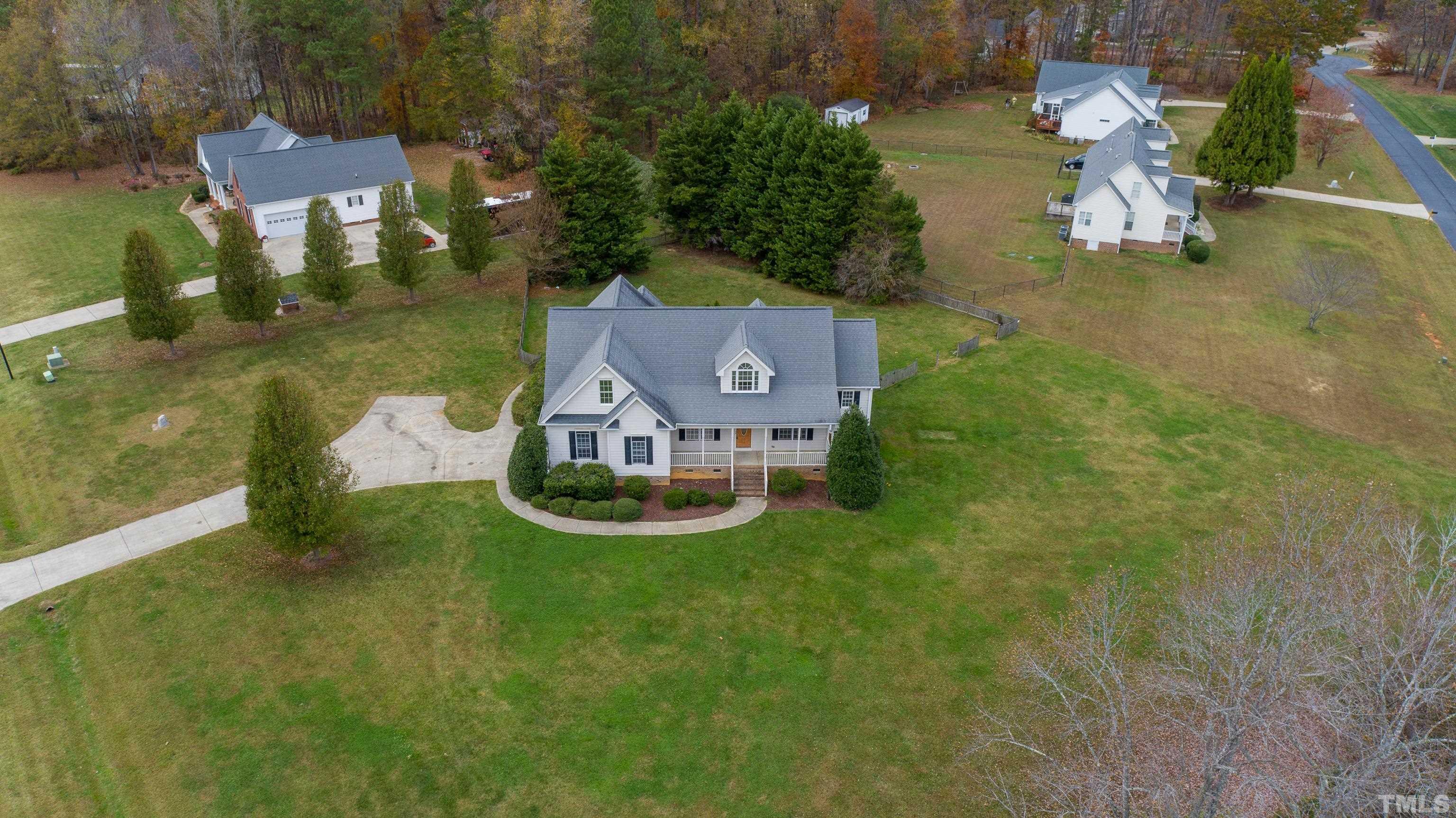 134 Fletcher Ridge Road Timberlake, NC 27583 - Photo 52 of 52 an aerial view of a house with a yard