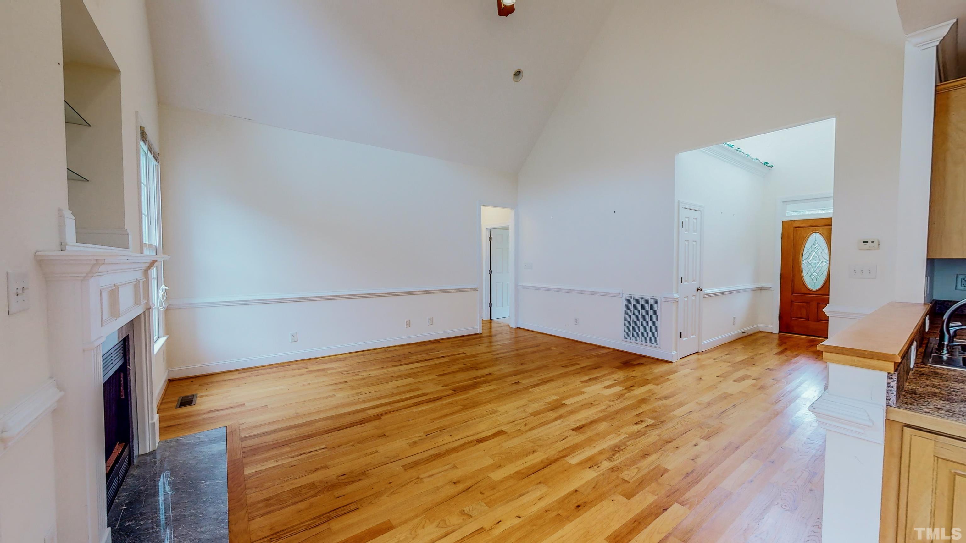 134 Fletcher Ridge Road Timberlake, NC 27583 - Photo 10 of 52 a view of empty room with wooden floor