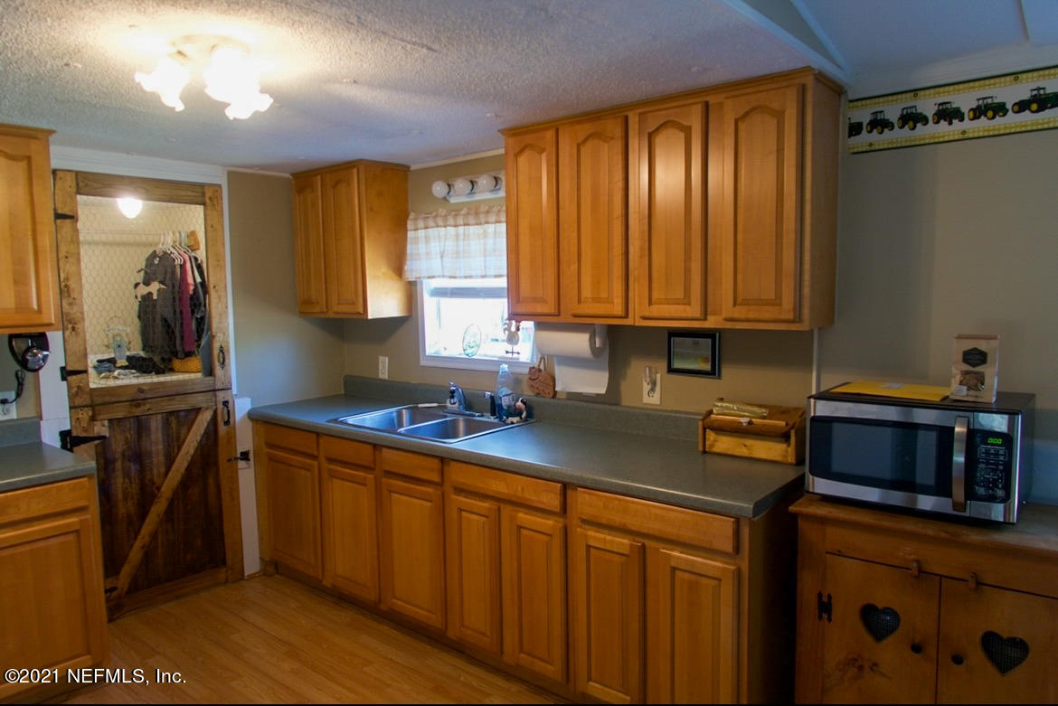 14166 Grover Road Jacksonville, FL 32226 - Photo 15 of 30 592B1A42-1CAE-4702-9DFF-4975701863ED