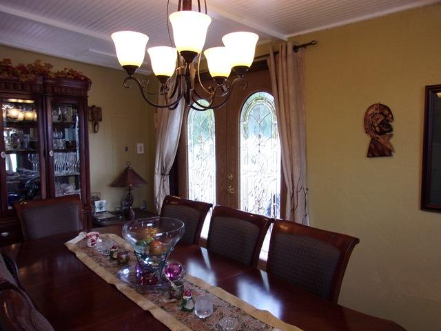 5588 South Rue Road West Palm Beach, FL 33415 - Photo 3 of 29 a front view of a house with couches table and chairs