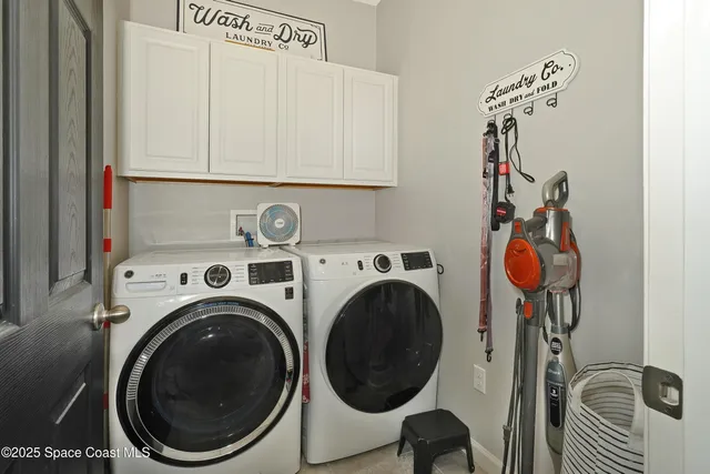 a view of a room with wooden walls