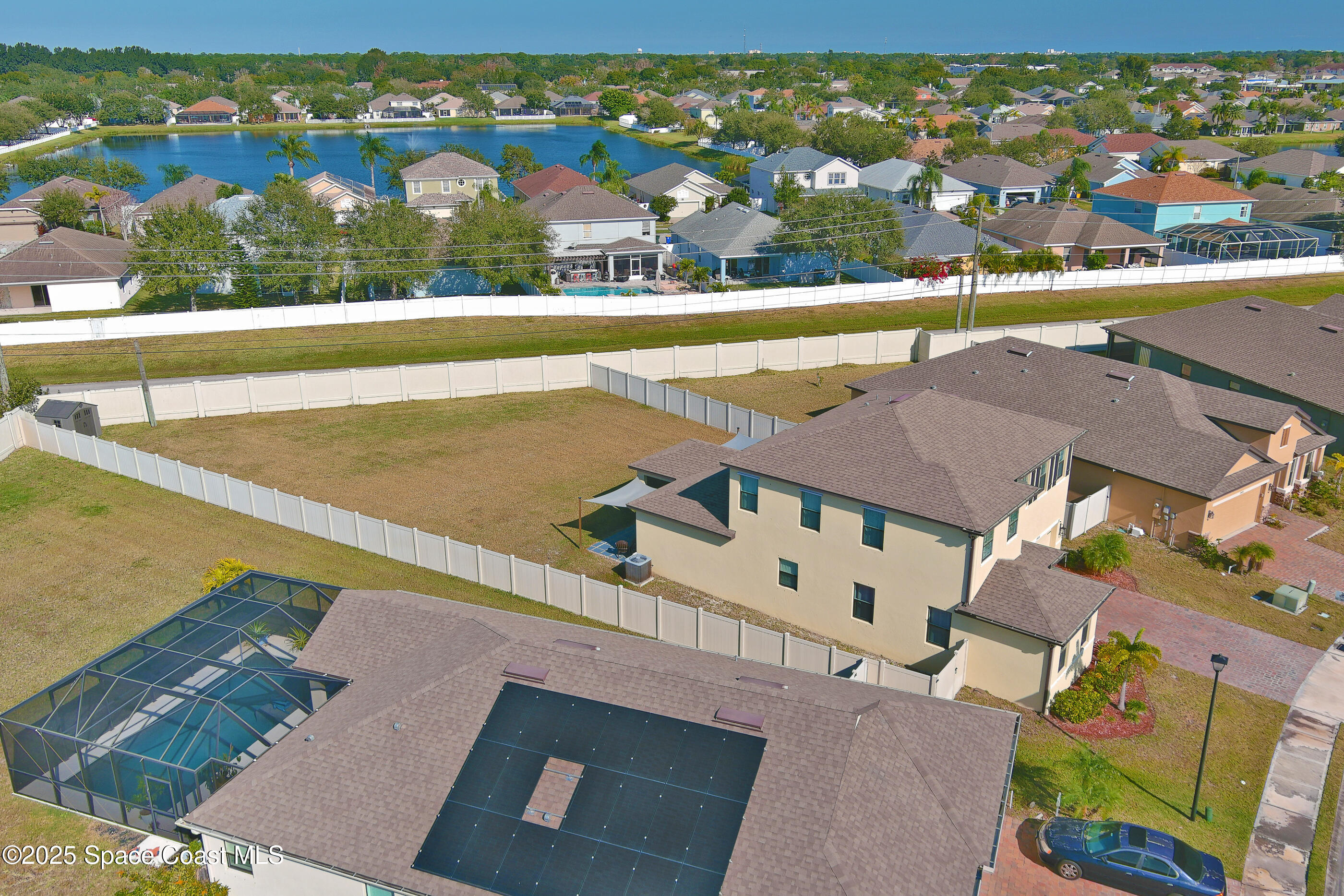 3488 Whimsical Circle Rockledge, FL 32955 - Photo 43 of 56 an aerial view of residential houses with outdoor space