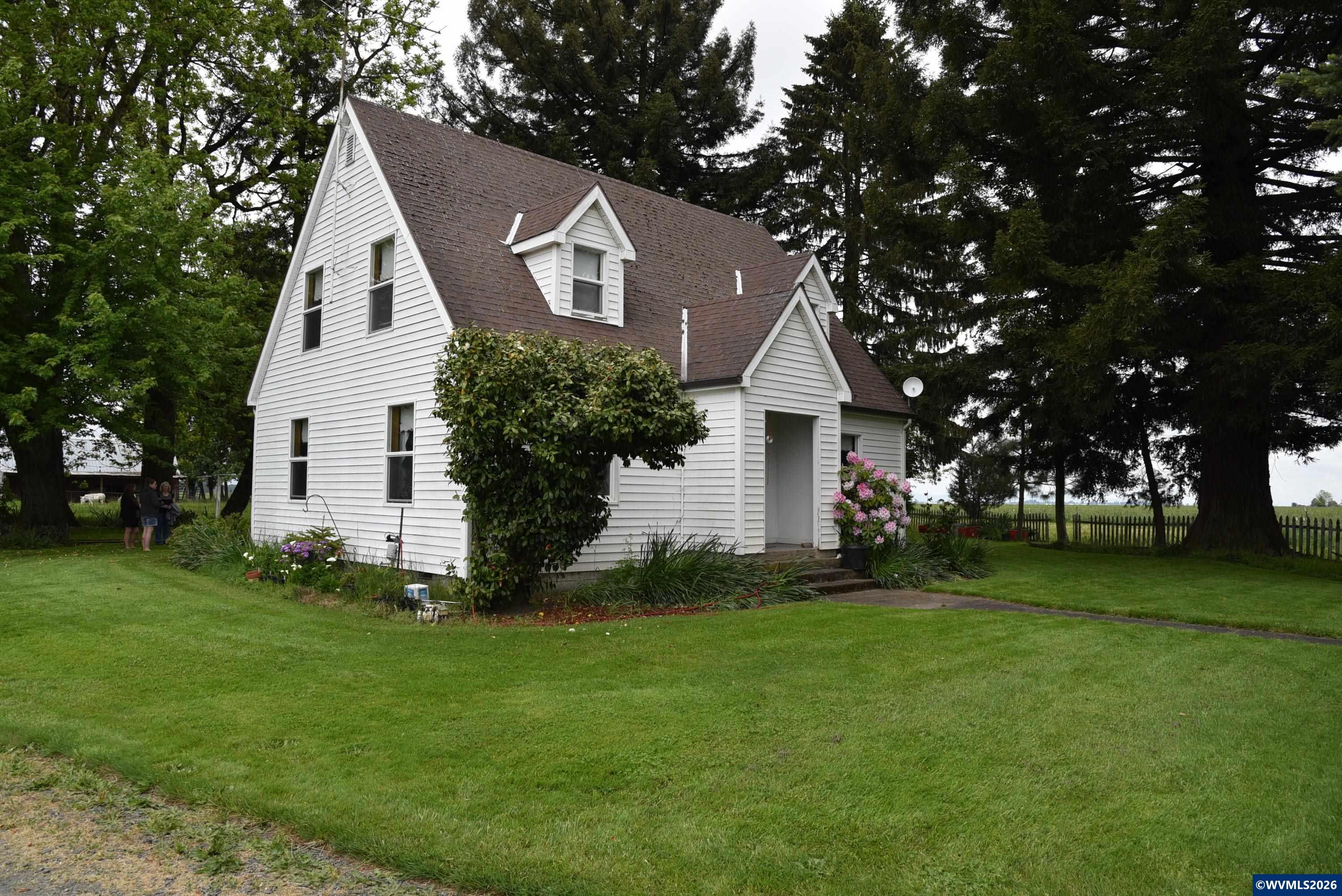 25258 Rowland Road Harrisburg, OR 97446 - Photo 1 of 24 a front view of house with a garden