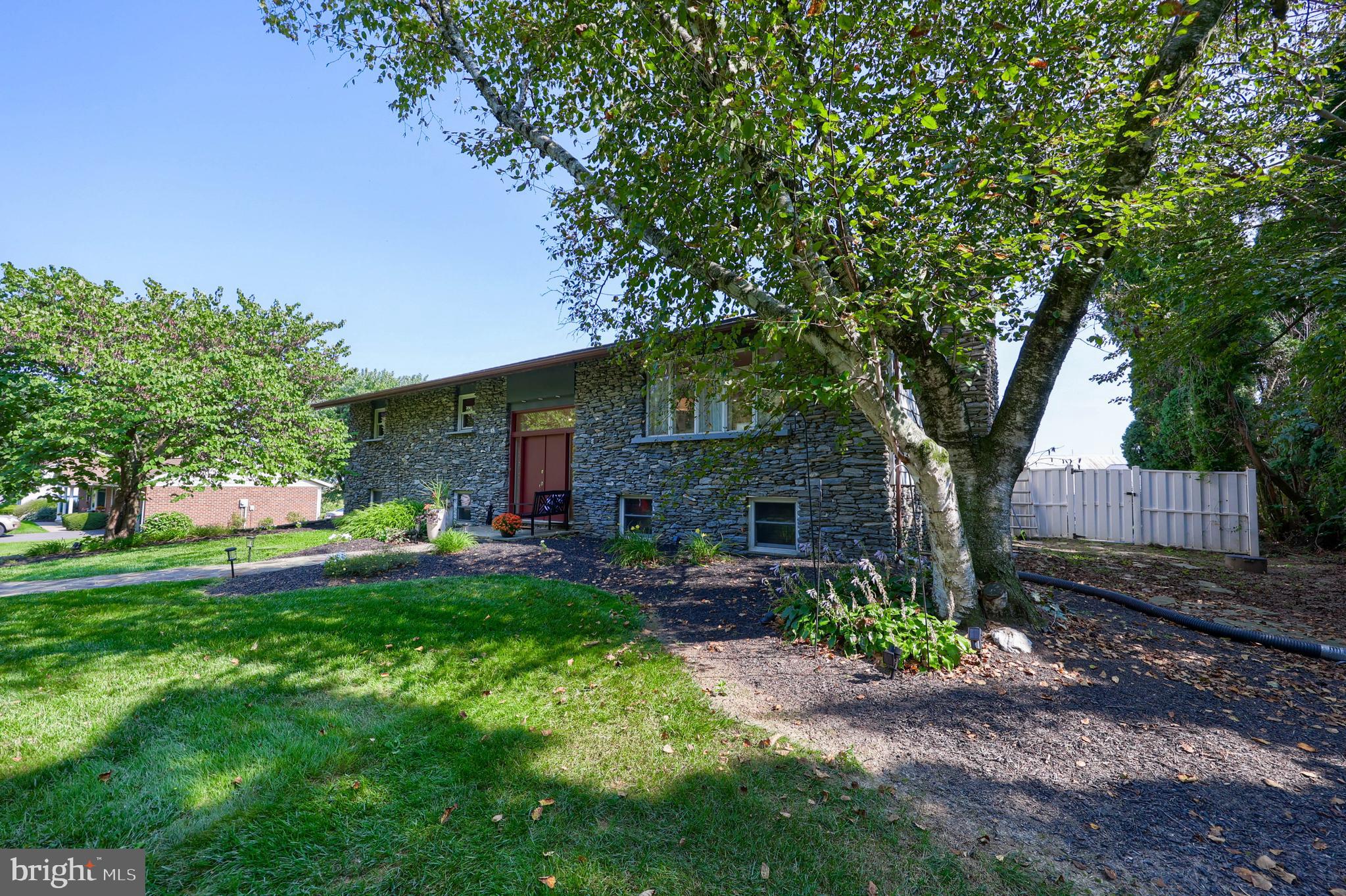 670 Shultz Road Washington Boro, PA 17582 - Photo 73 of 79 a backyard of a house with seating space