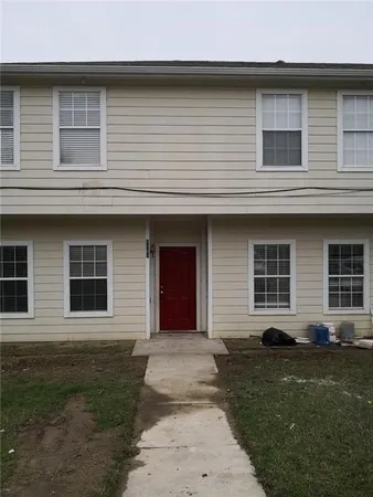 a house view with a backyard space
