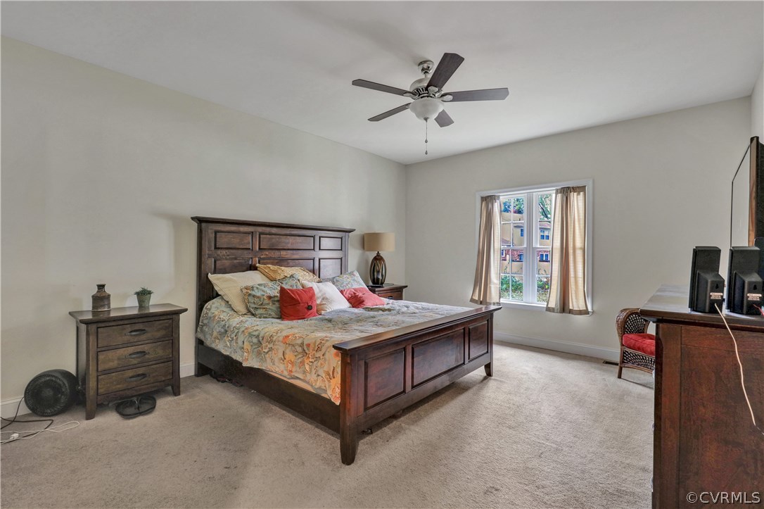 4112 Hidden Valley Road Chester, VA 23831 - Photo 12 of 29 a bedroom with a bed and a tv