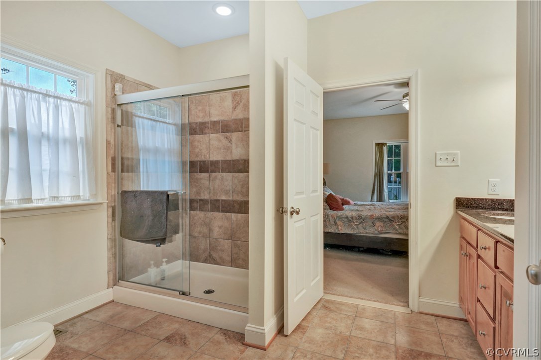 4112 Hidden Valley Road Chester, VA 23831 - Photo 15 of 29 a bathroom with a tub and shower