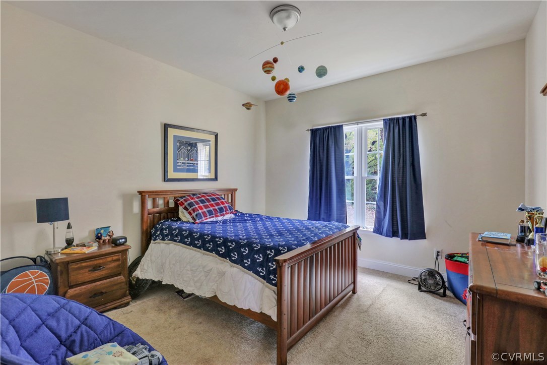 4112 Hidden Valley Road Chester, VA 23831 - Photo 17 of 29 a bedroom with bed and window
