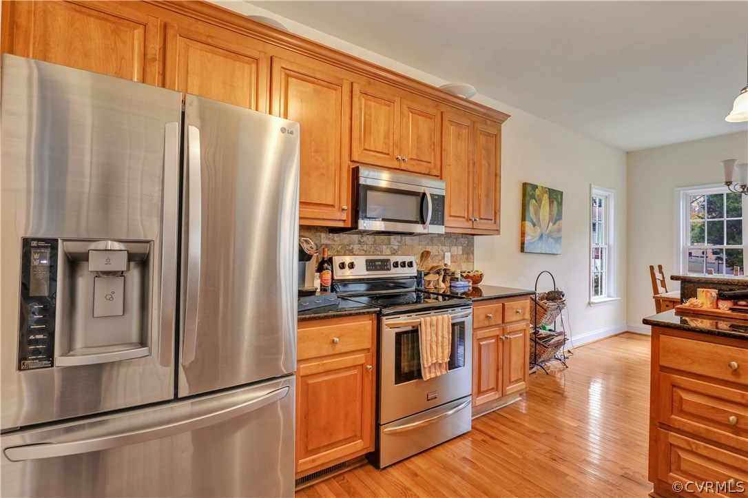 4112 Hidden Valley Road Chester, VA 23831 - Photo 8 of 29 a kitchen with stainless steel appliances granite countertop a refrigerator stove and sink