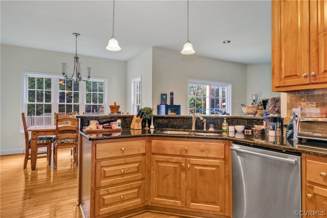 4112 Hidden Valley Road Chester, VA 23831 - Photo 10 of 29 a kitchen with stainless steel appliances granite countertop a sink and cabinets