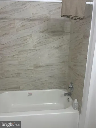 a bathroom with a bathtub