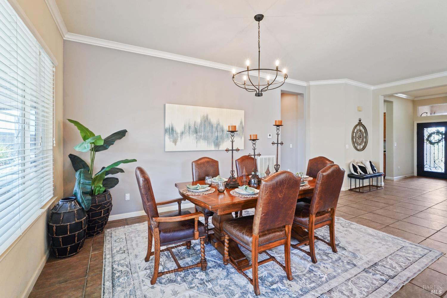 341 Watson Hollow Drive Rio Vista, CA 94571 - Photo 15 of 38 a dining room with furniture a chandelier and wooden floor