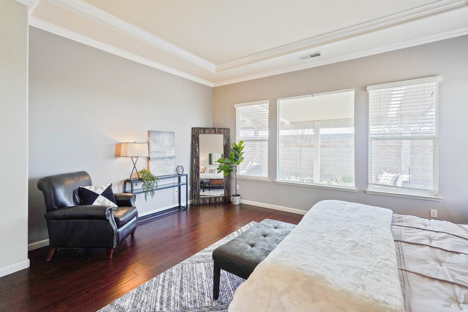 341 Watson Hollow Drive Rio Vista, CA 94571 - Photo 17 of 38 a bedroom with furniture and wooden floor