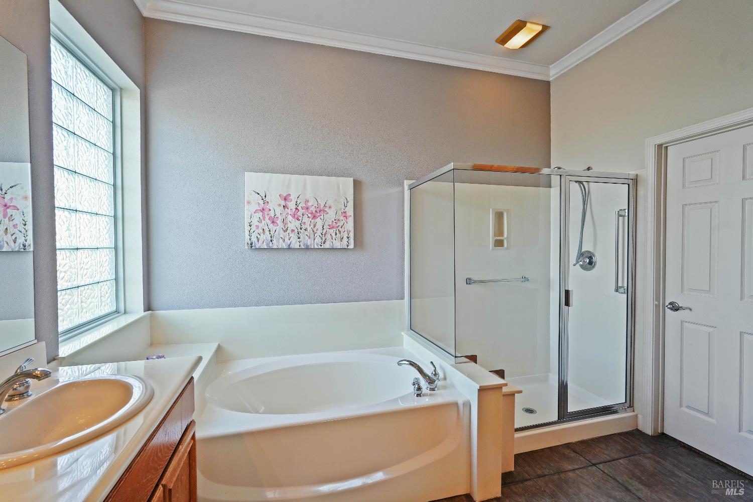 341 Watson Hollow Drive Rio Vista, CA 94571 - Photo 19 of 38 a bathroom with a tub a sink and a window